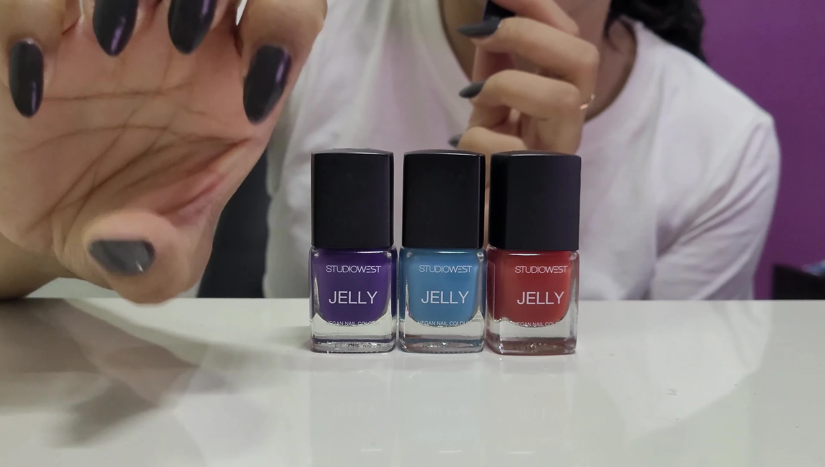 The reviewer's nails with Westside Jelly polish