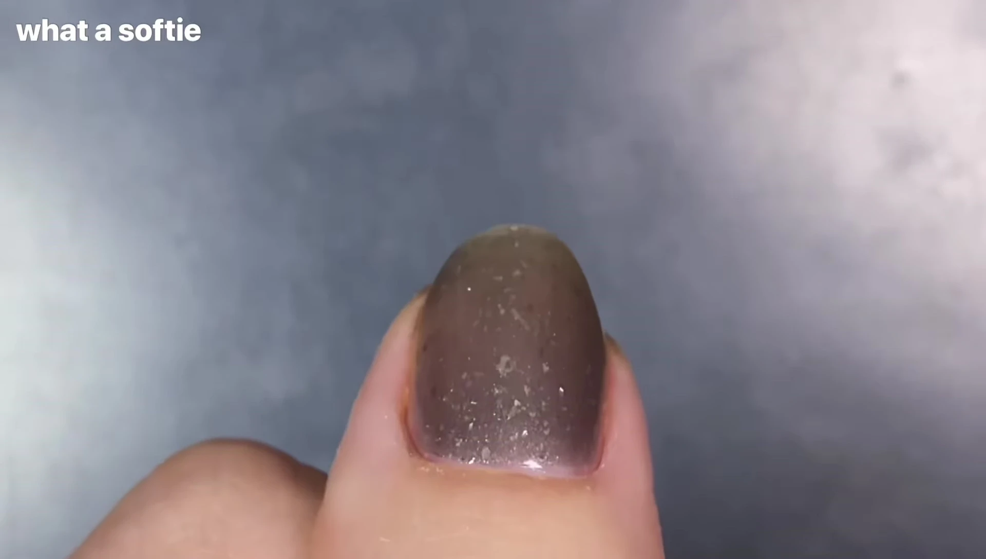 Bottle of What a Softy polish demonstrating its color and texture.