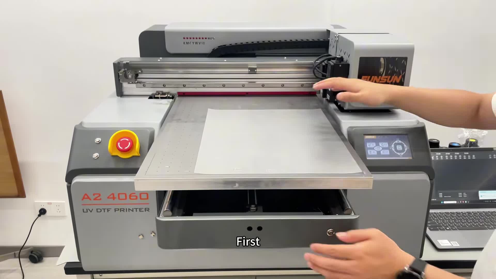 Close-up of the UV printer printing on the nail art film.