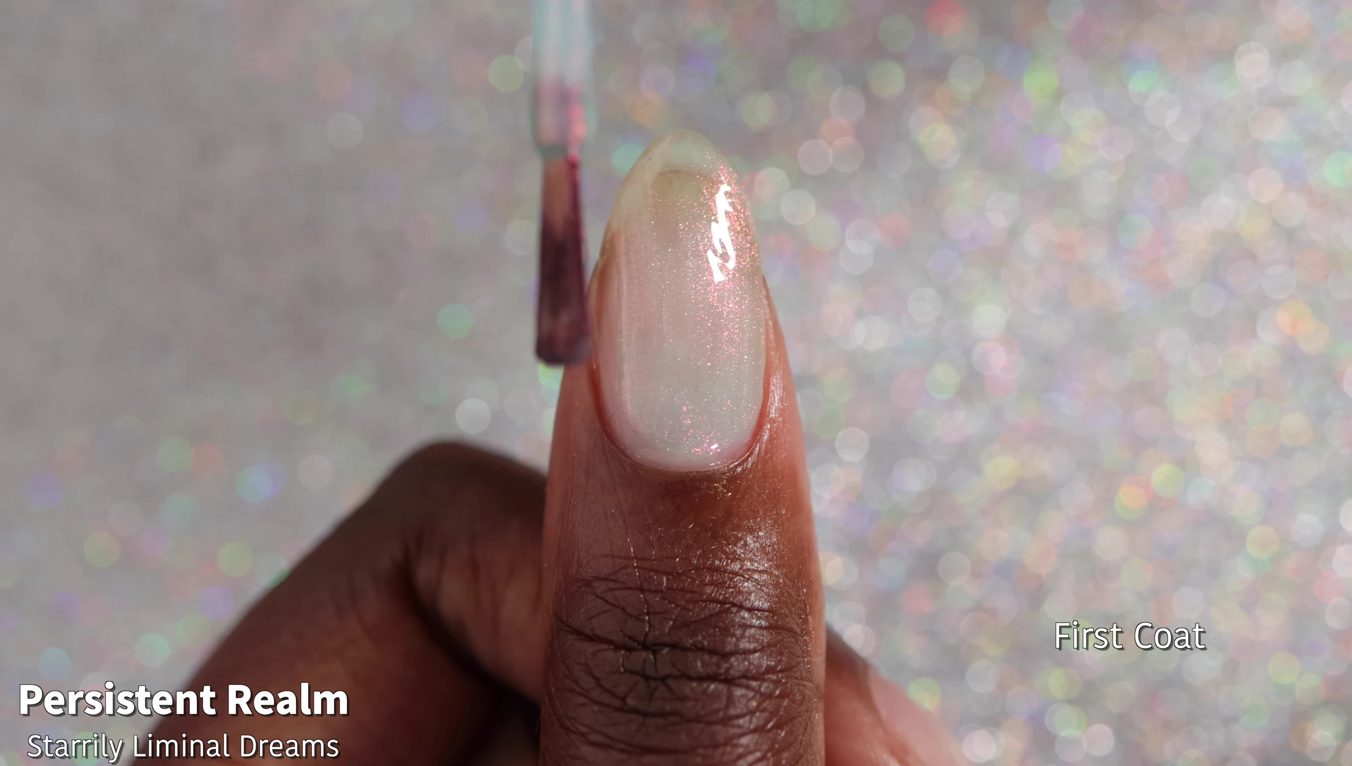 Swatches of Persistent Realm on nails