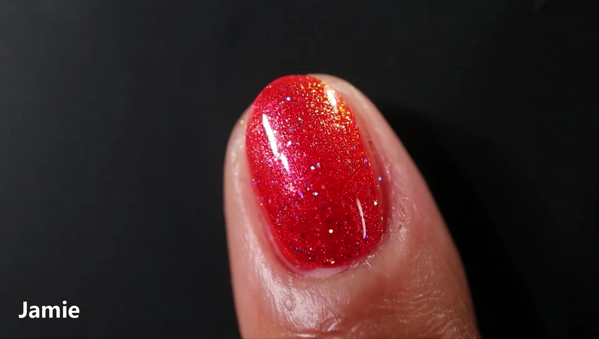 Jamie polish on nails with glossy topcoat