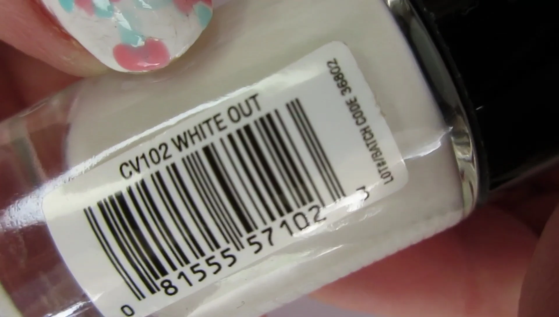 Image showcasing the opacity and even application of the white nail polish.