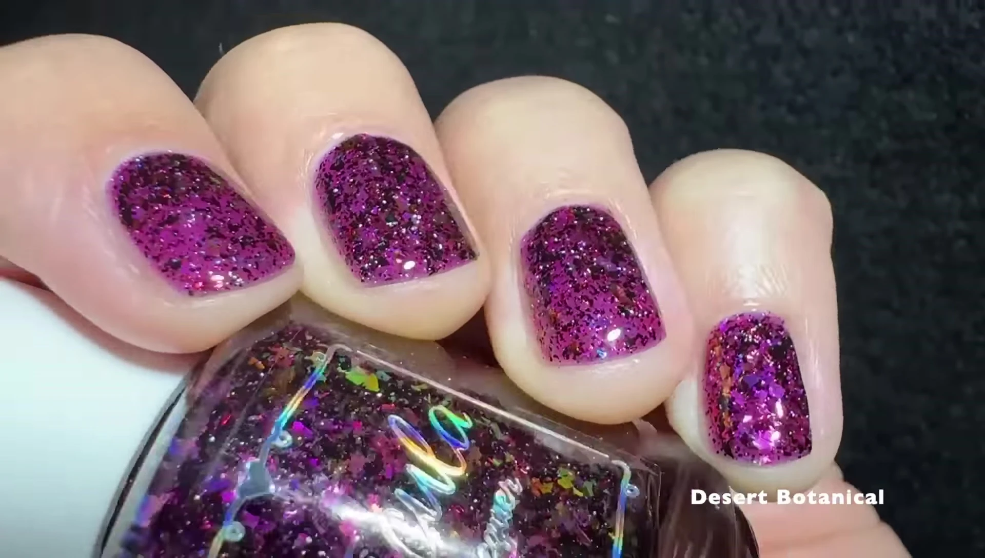 Desert Botanical nail polish on a hand with top coat