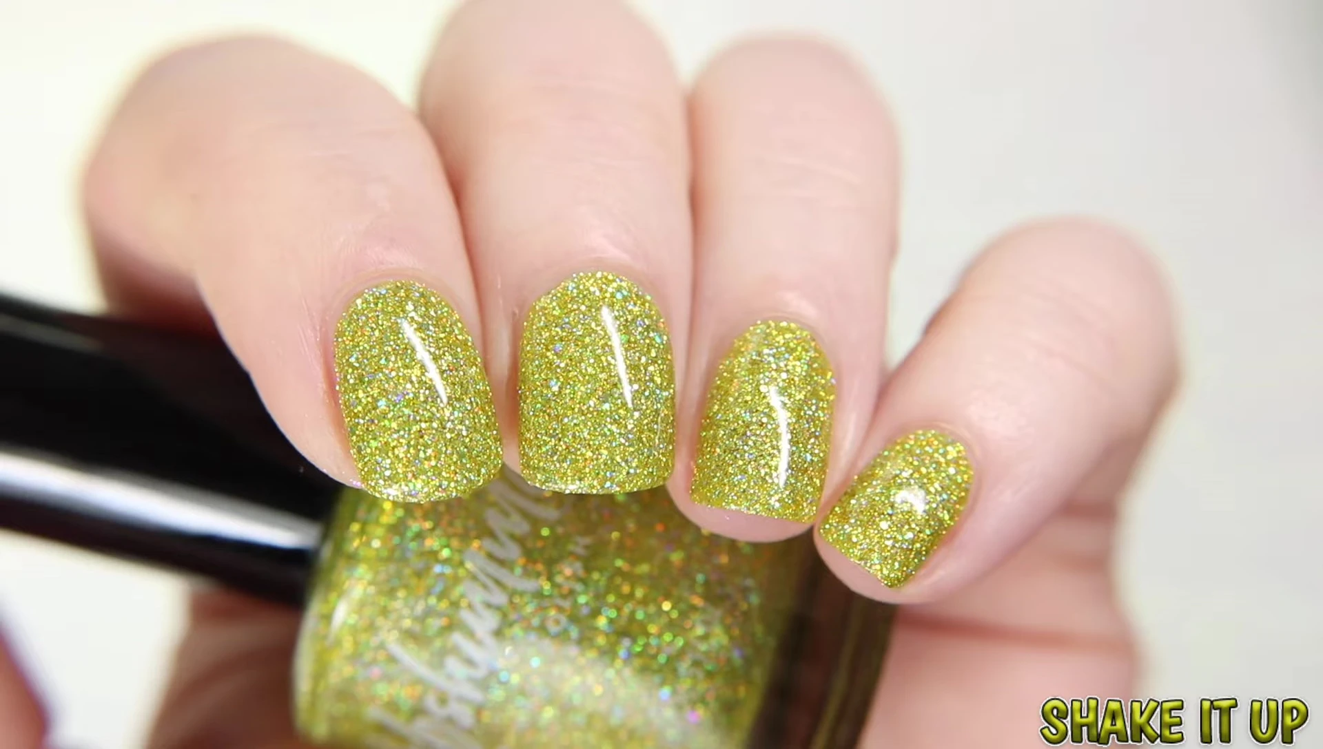 Shake It Up under different lighting, showing the intensified holo effect.