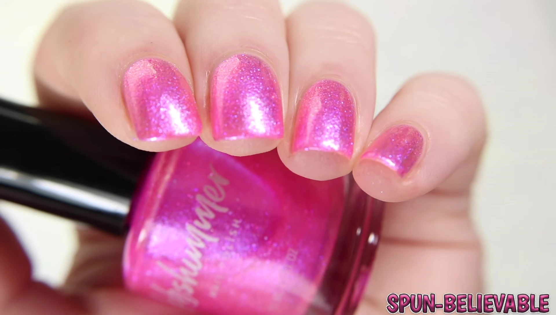 Spunbelievable under low lighting, showcasing the peachy shift and intensified gold shimmer.