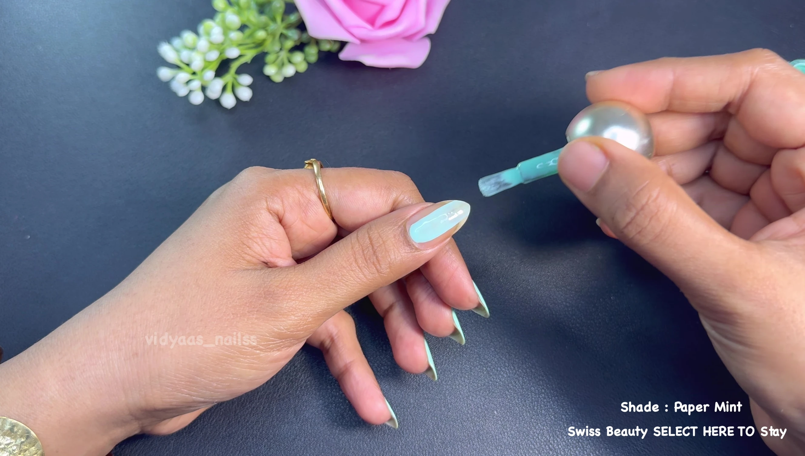 Swatch of Pepper nail polish, a refreshing mint green.