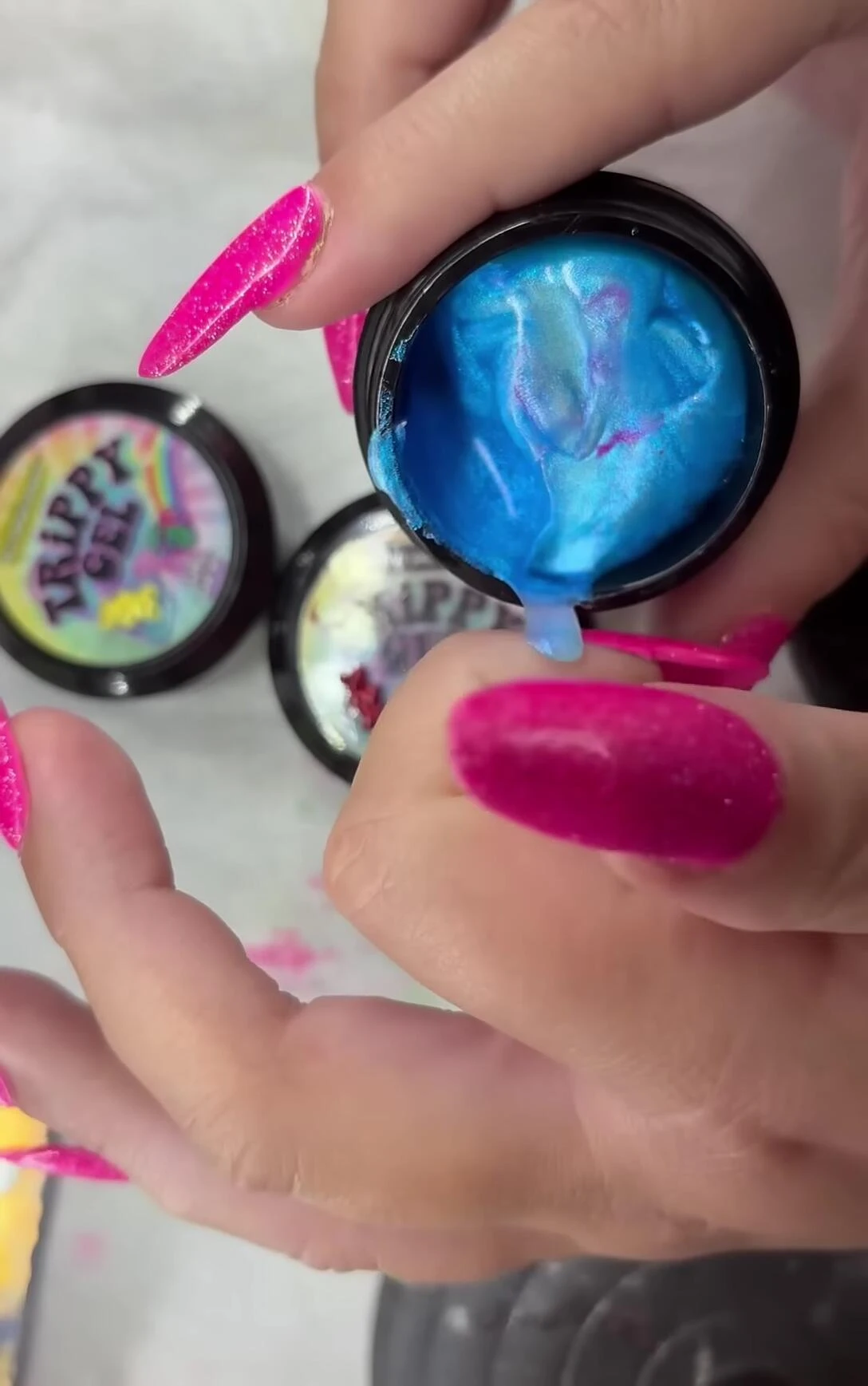 The reviewer holding the Trippy Gels