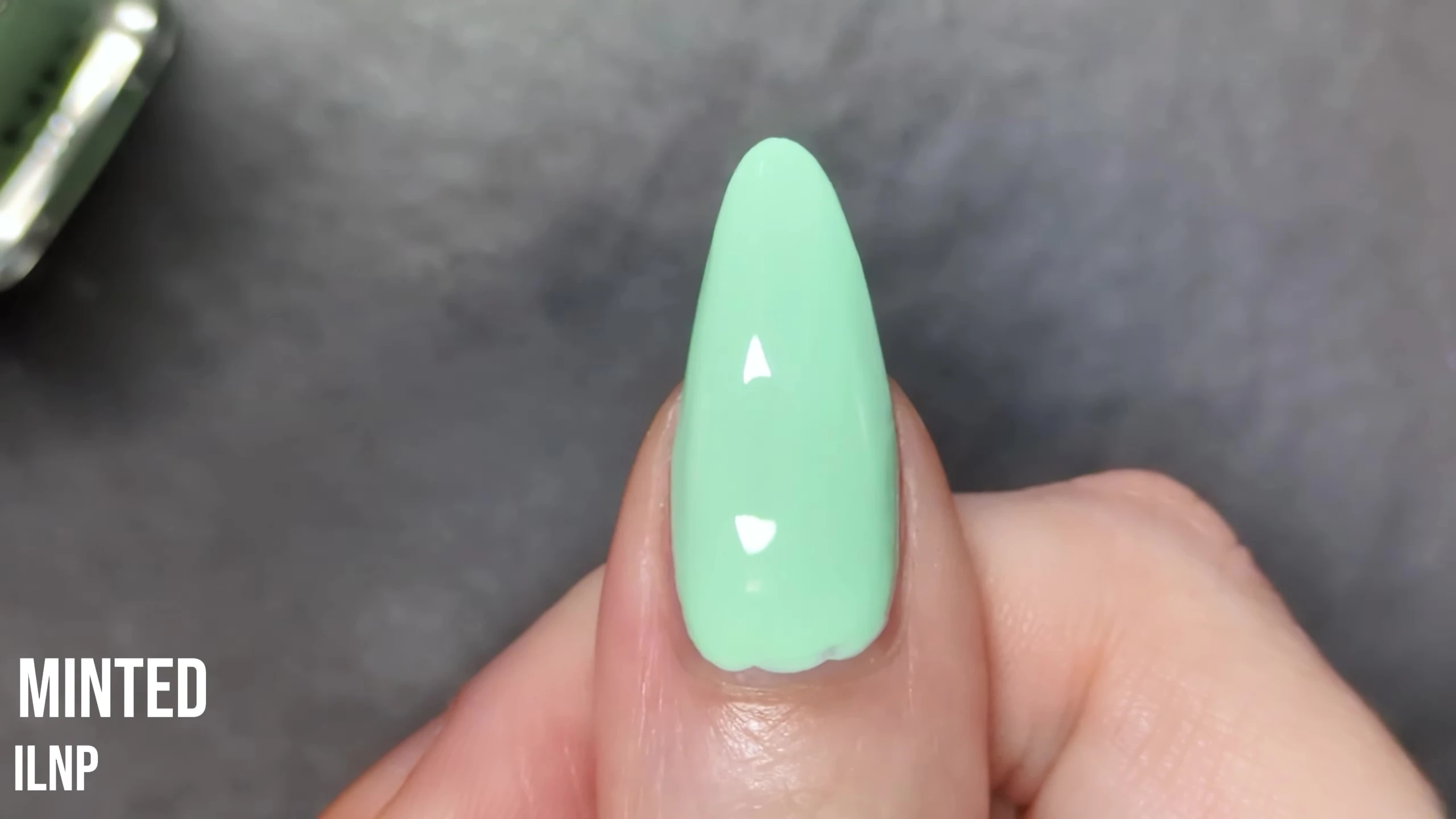 Final result of Minted nail polish on the model's nail