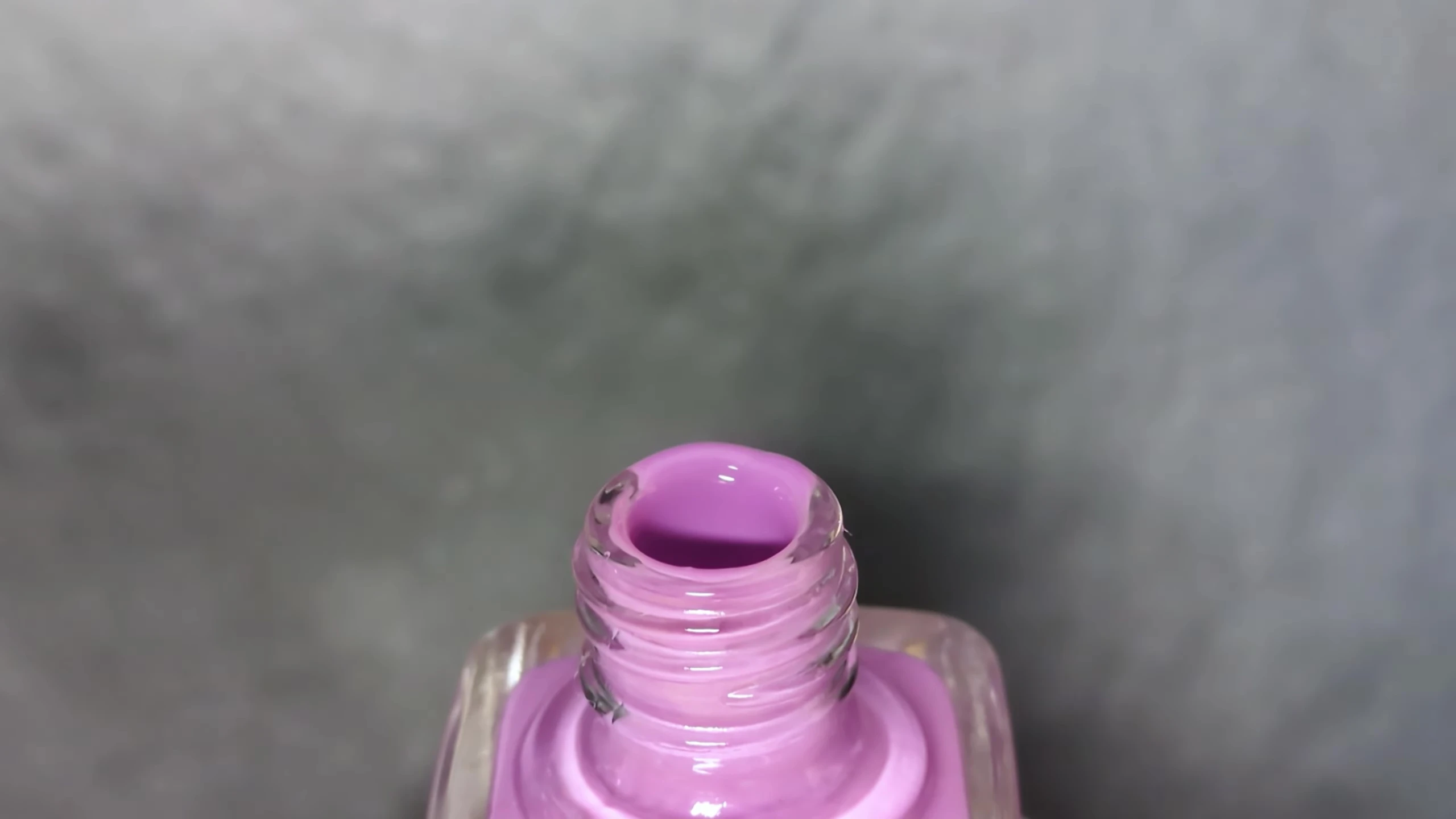 Close-up of Melted nail polish on the model's nail
