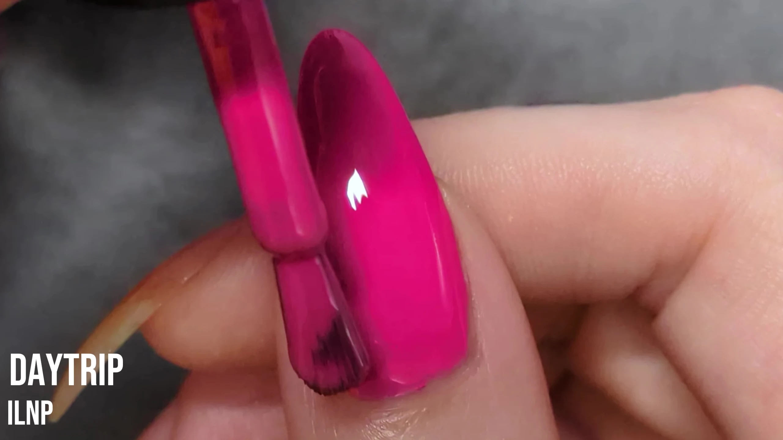 Day Trip nail polish on the model's nail