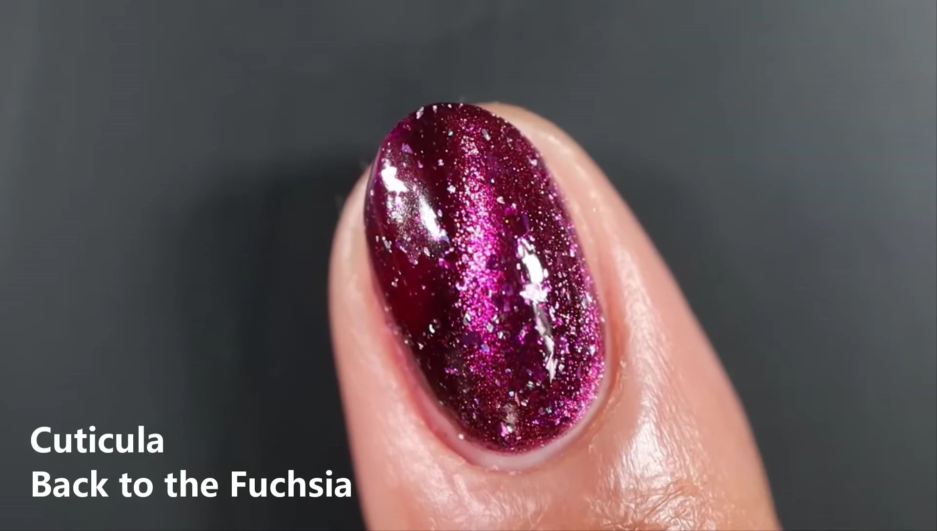 Hand swatch of Back to the Fuchsia magnetized with a ring magnet.