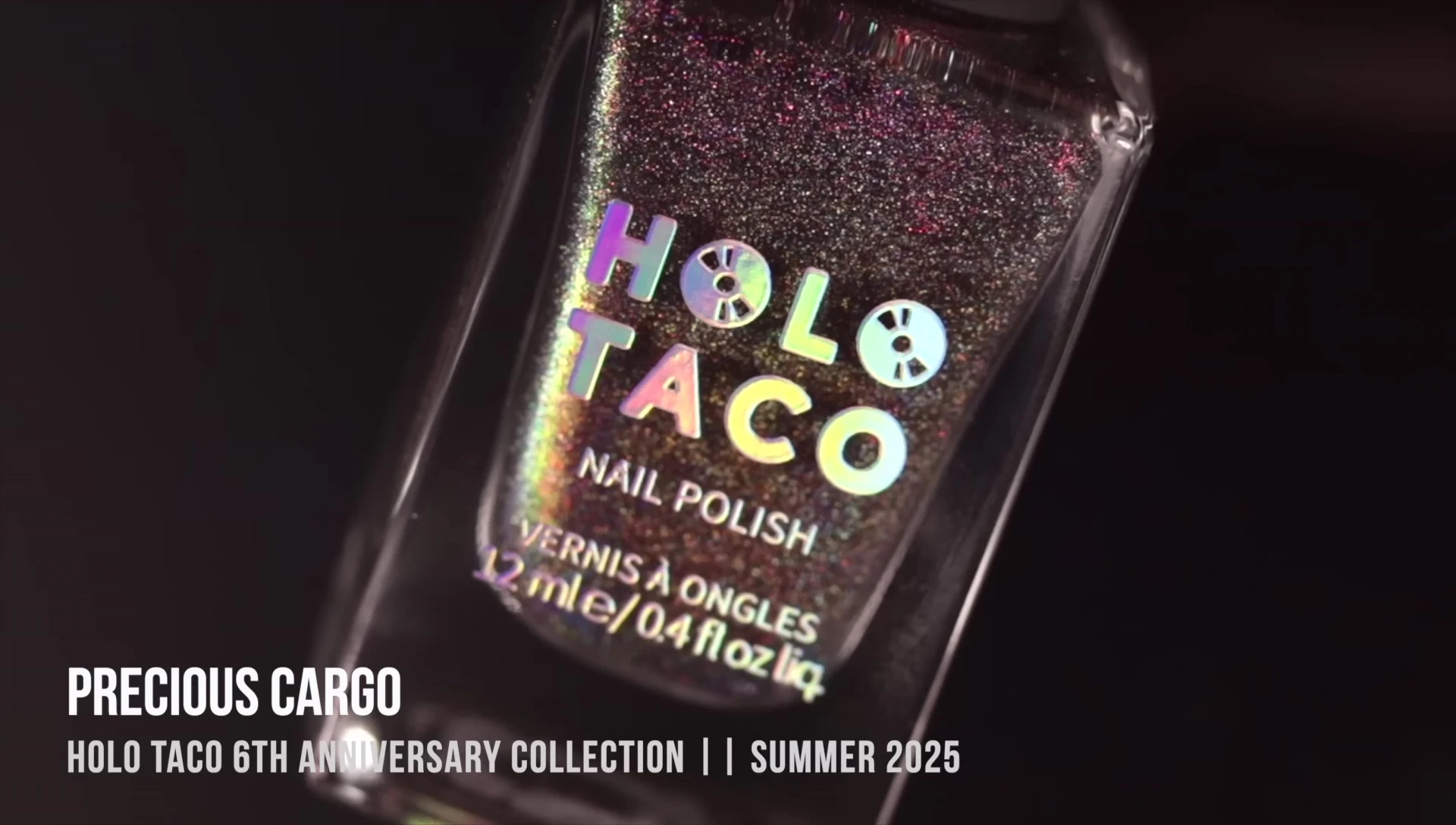 Close-up shot of Precious Cargo, highlighting its multi-chrome and linear holo effects.